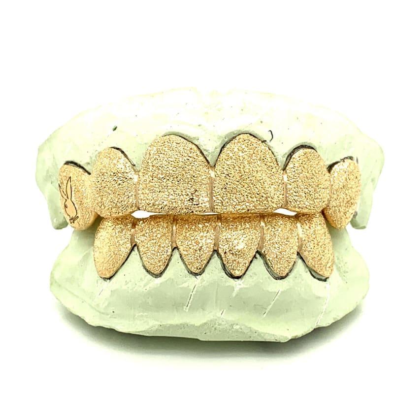 12pc Gold Dusted Playboy Grillz - Seattle Gold Grillz