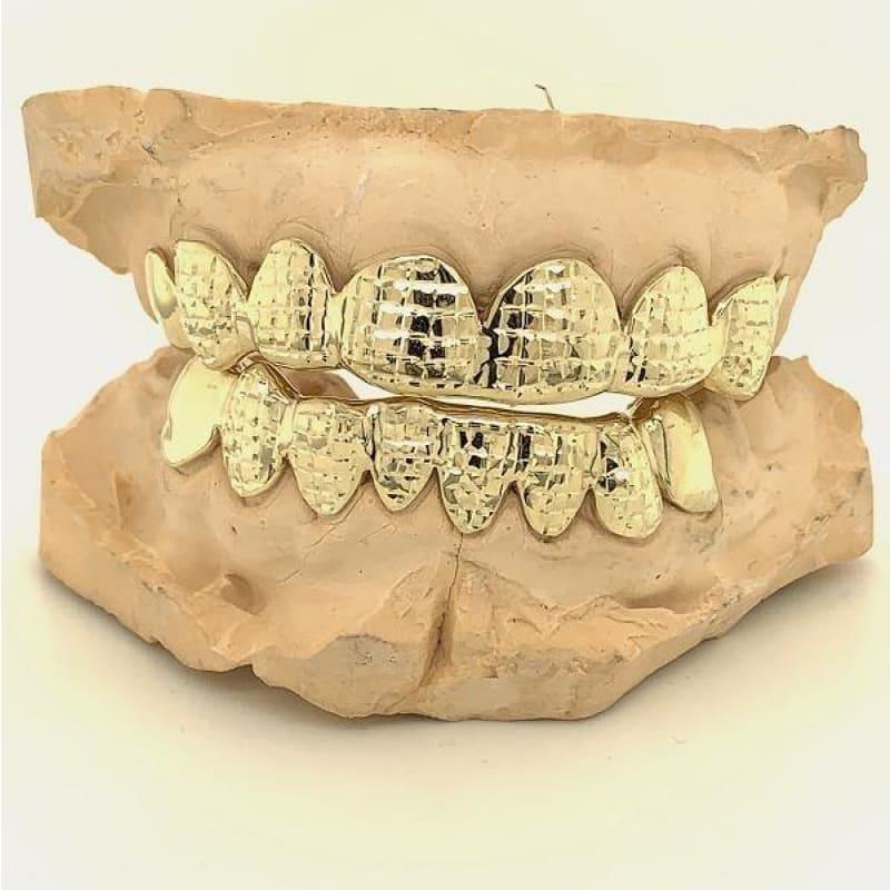 16pc Gold Grillz with 12 teeth covered in Polished Princess Cuts - Seattle Gold Grillz