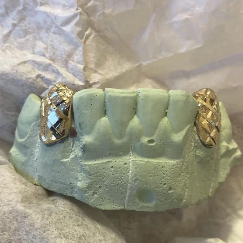 2pc Gold Trillion Cut Half Dusted Bottom Fangs - Seattle Gold Grillz